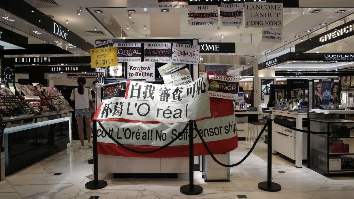 Lancome shuts Hong Kong shops as 'kowtow' controversy grows