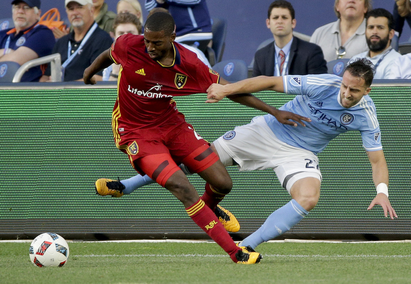Real Salt Lake defender Aaron Maund, left, vies for the ball against New York City FC defender RJ Allen during the first half of an MLS soccer game, Thursday, June 2, 2016, in New York. Real Salt Lake won 3-2. (AP Photo/Julie Jacobson)