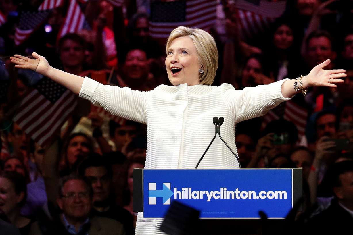 Democratic presidential candidate Hillary Clinton gestures as she greets supporters at a presidential primary election night rally, Tuesday, June 7, 2016, in New York. (AP Photo/Julio Cortez)