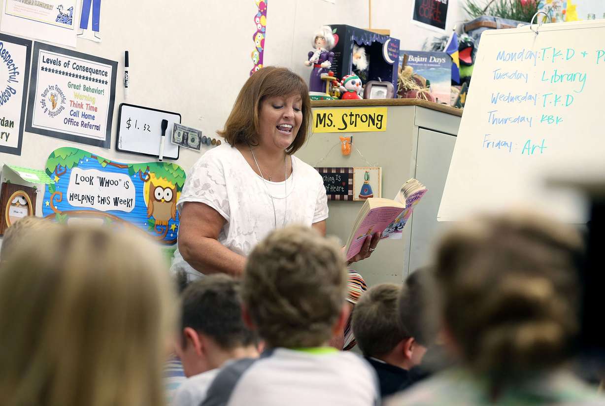 First-grade teacher Chris Strong reads to her students at South Jordan Elementary School on Wednesday, June 8, 2016. (Photo: Laura Seitz, Deseret News)