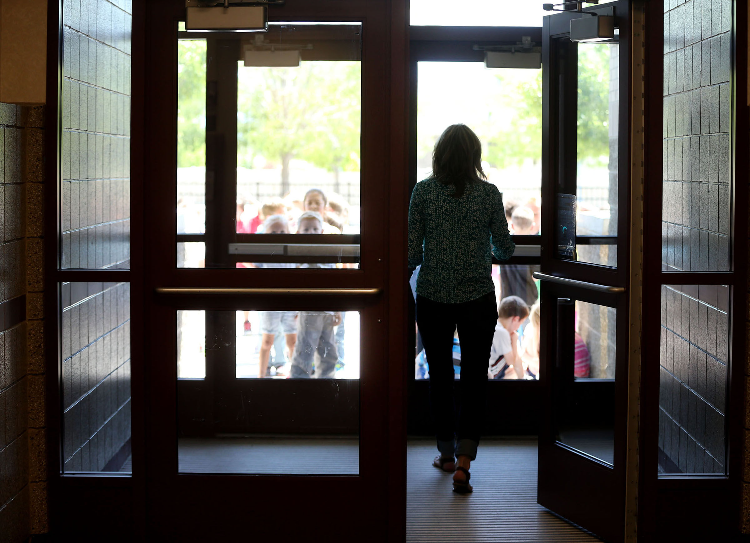 First-grade teacher Nicole Walbeck gets her students from recess at South Jordan Elementary School on Wednesday, June 8, 2016. (Photo: Laura Seitz, Deseret News)