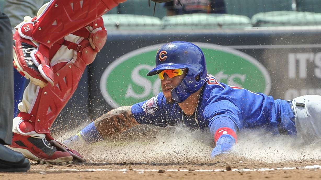 Lester allows no earned runs as Cubs rout Braves 13-2