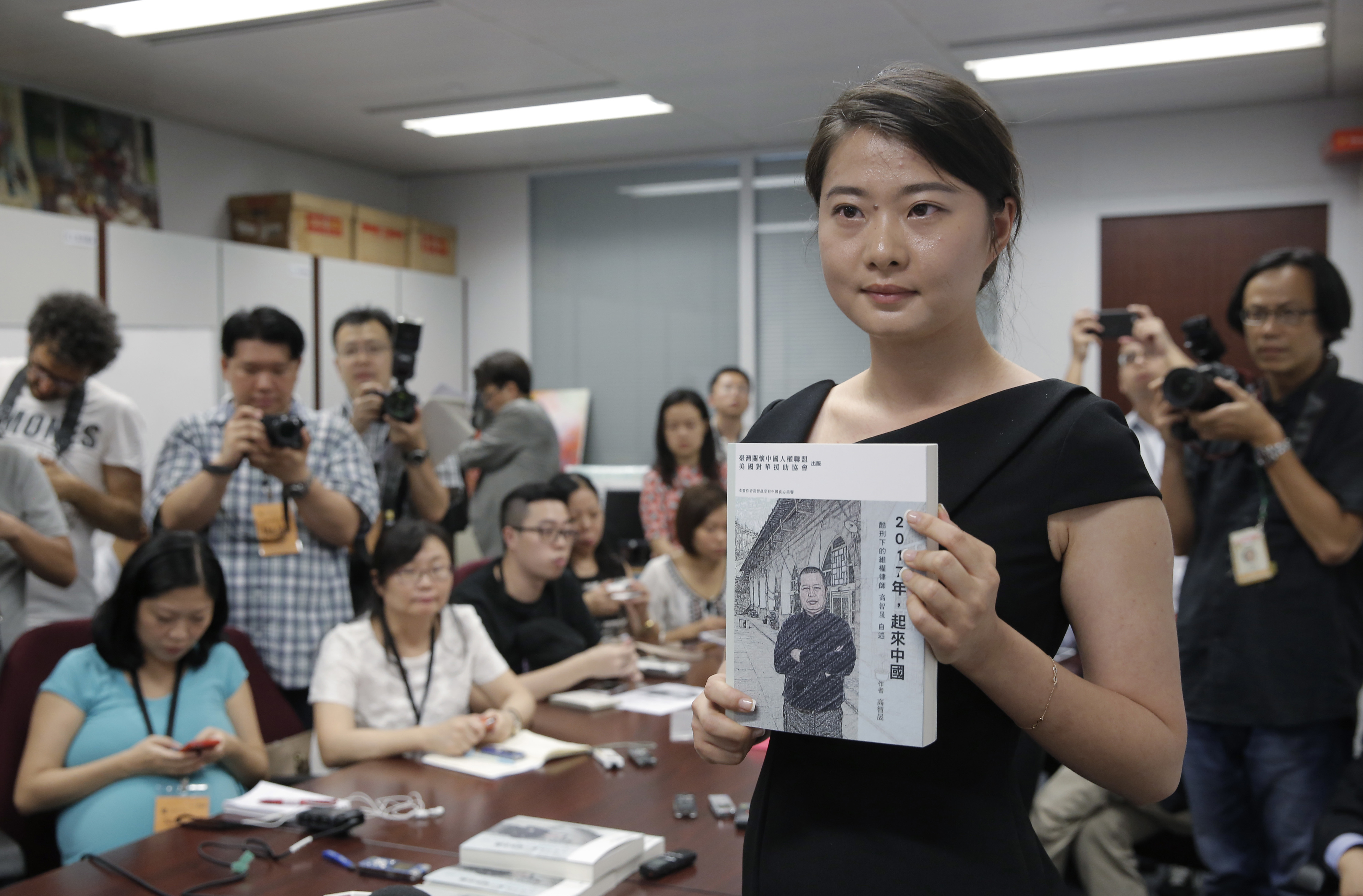 AP Interview: Chinese lawyer not giving up despite torture