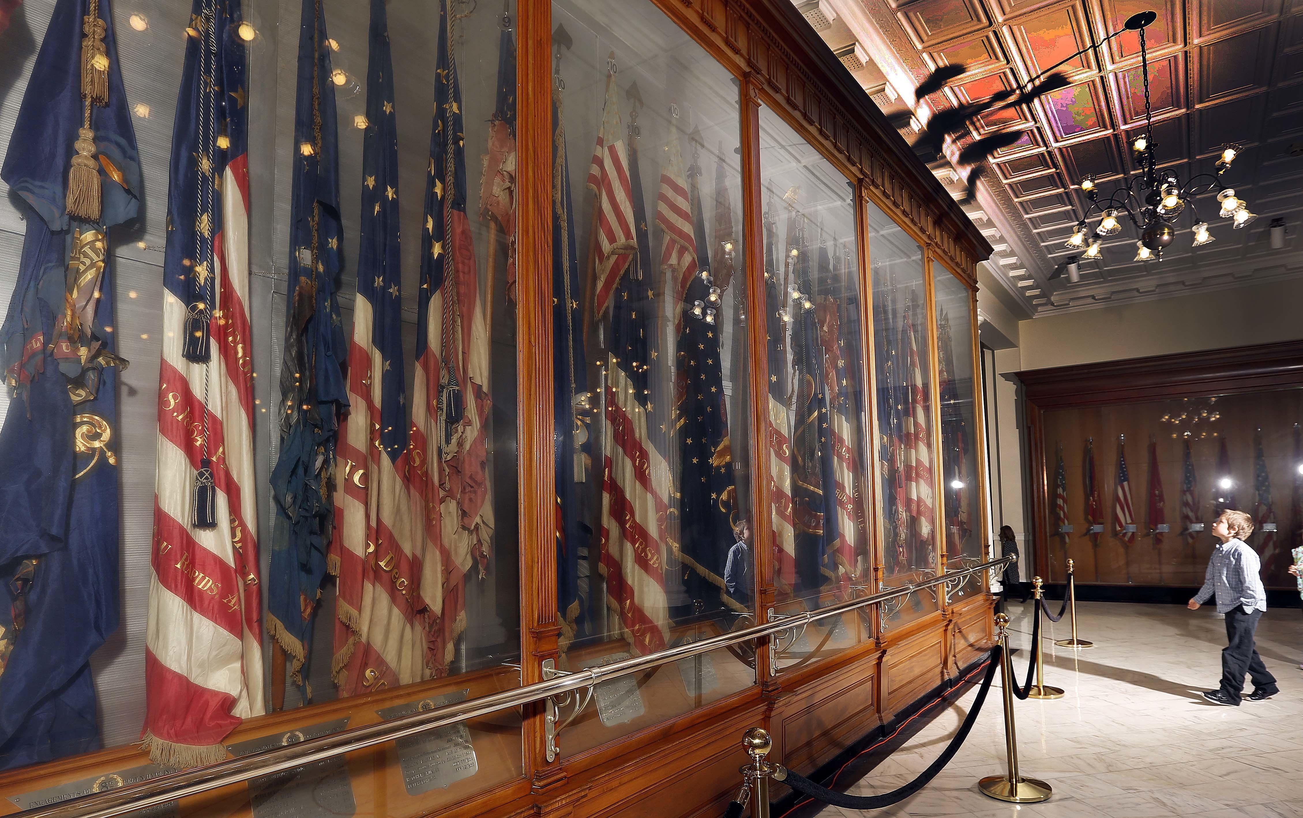 As historic flags age, civil war brews over preservation