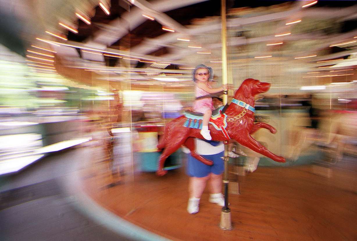 The Carousel at Lagoon on July 1, 2000. At the time the carousel was 100 years old and boasts hand carved and painted animals worth between $20,000 and $80,000 each. (Deseret News Archives)