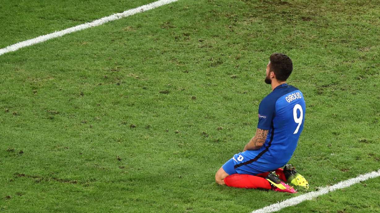 The Latest: Turkey fans light flares after loss to Spain