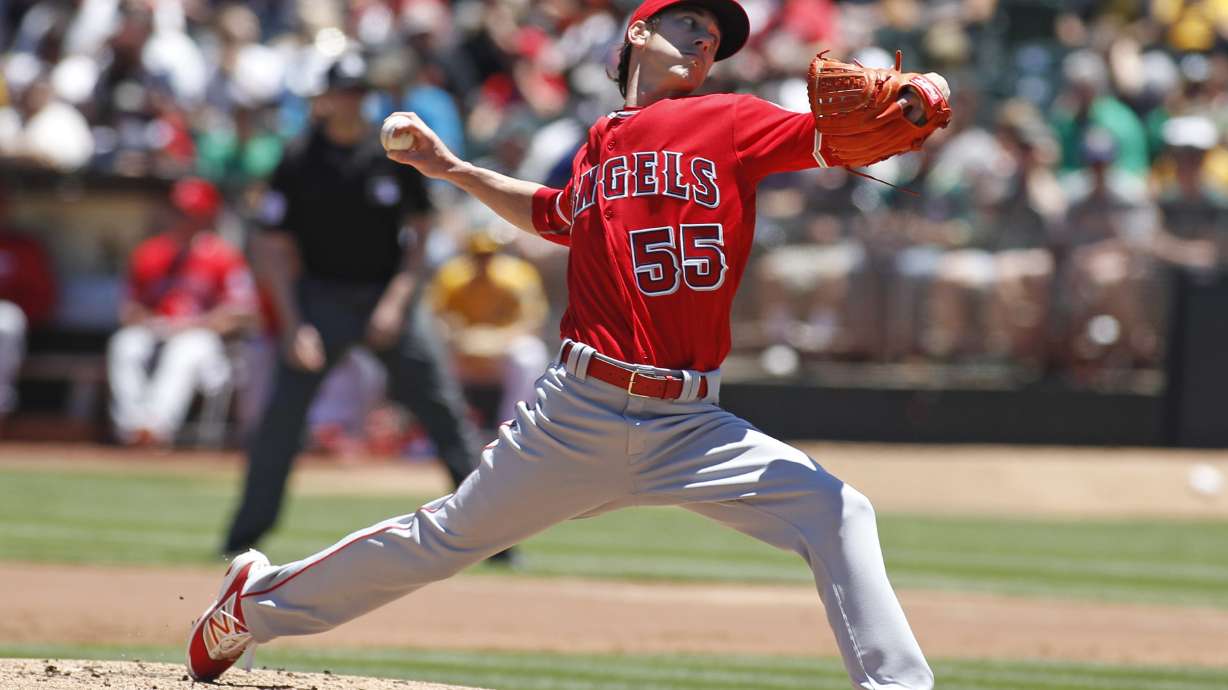 Lincecum wins in return to majors, pitches Angels past A's