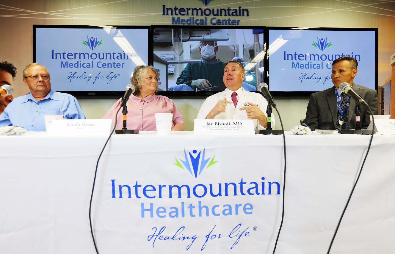Dennis Green, left, and his wife, Linda, Jay Bishoff, director of the Intermountain Urological Institute, and Cory Smith, a Healthcare Transformation Lab specialist, speak during a press conference at Intermountain Medical Center in Murray on Monday, June 20, 2016. (Photo: Scott G Winterton, Deseret News)