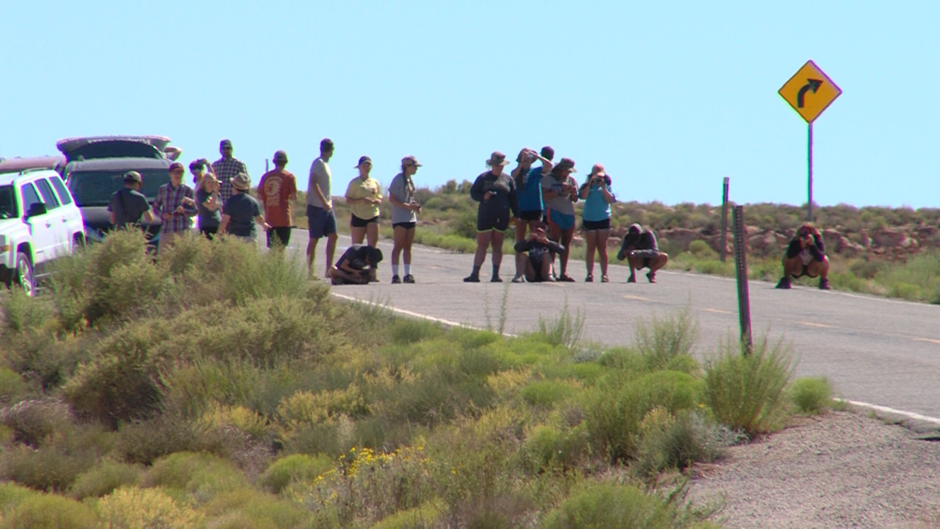 Tourists take photos at mile marker 13 on U.S. 163. The spot is featured in the 1994 film "Forrest Gump." It's the spot where Forrest Gump, played by Tom Hanks, decides to stop running. (Photo: Eric Betts, Deseret News)