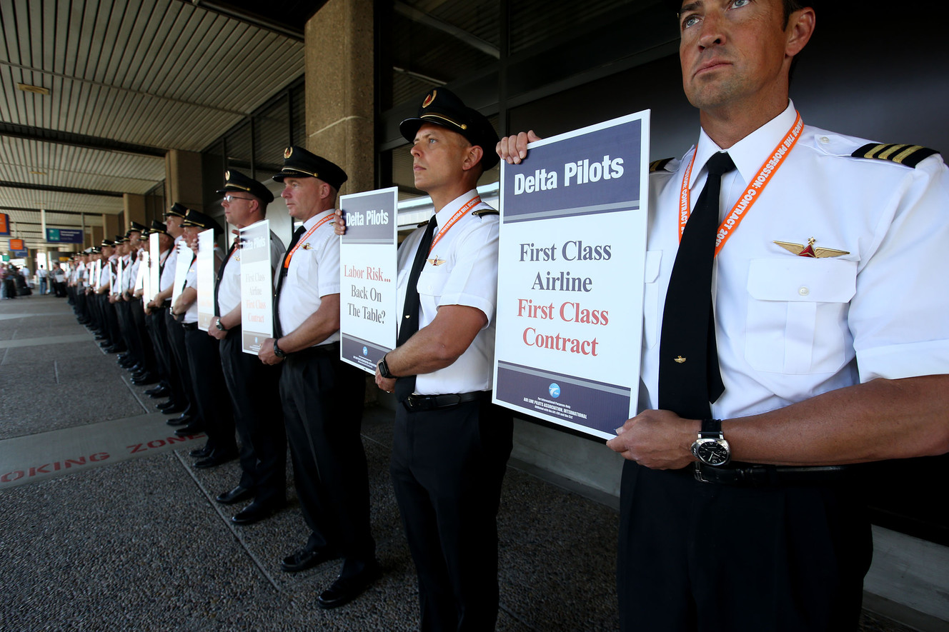 Delta Air Line pilots conduct informational picketing at the Delta terminal of the Salt Lake City International Airport on Friday, June 24, 2016, to raise the sense of urgency in the ongoing negotiations. Over five months have passed since the contract's amendable date. Fifteen months of negotiations have passed, and the Delta pilots are still awaiting a new agreement. (Photo: Laura Seitz, Deseret News)