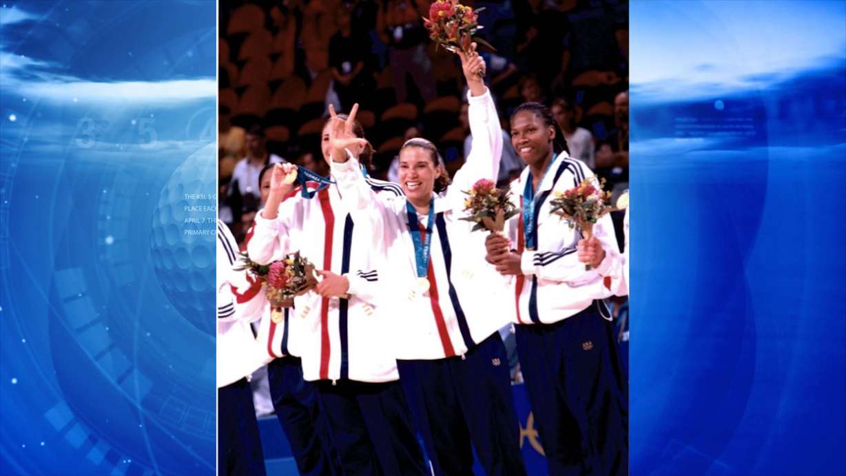 Former Utah Starzz forward and Team USA gold medalist Natalie Williams signals 'I love you' to her mother in the crowd after winning gold at the 2000 Summer Games in Sydney, Australia. (Courtesy photo: Natalie Williams)