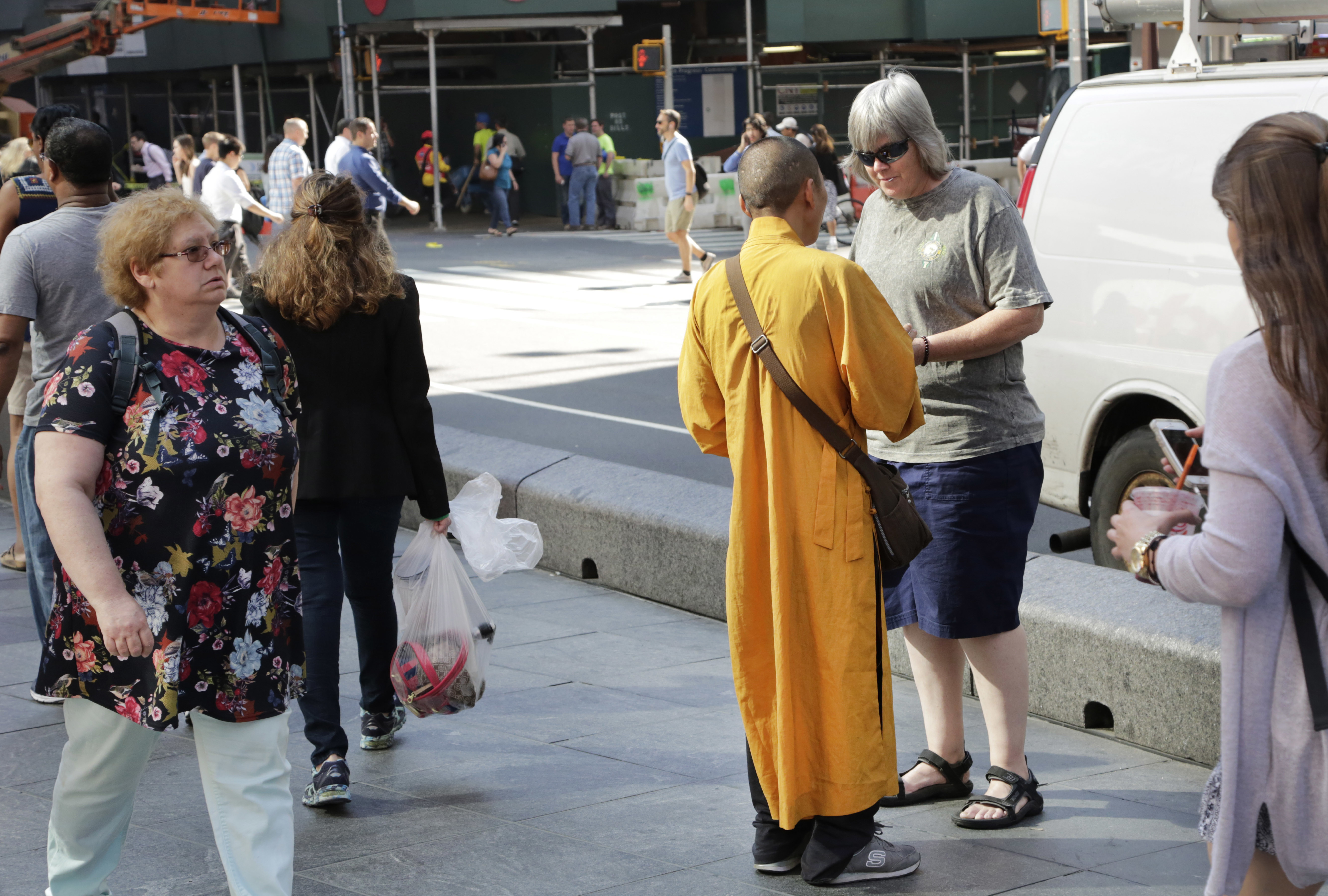 Fake monks? Buddhist leaders warn NYC tourists to be wary