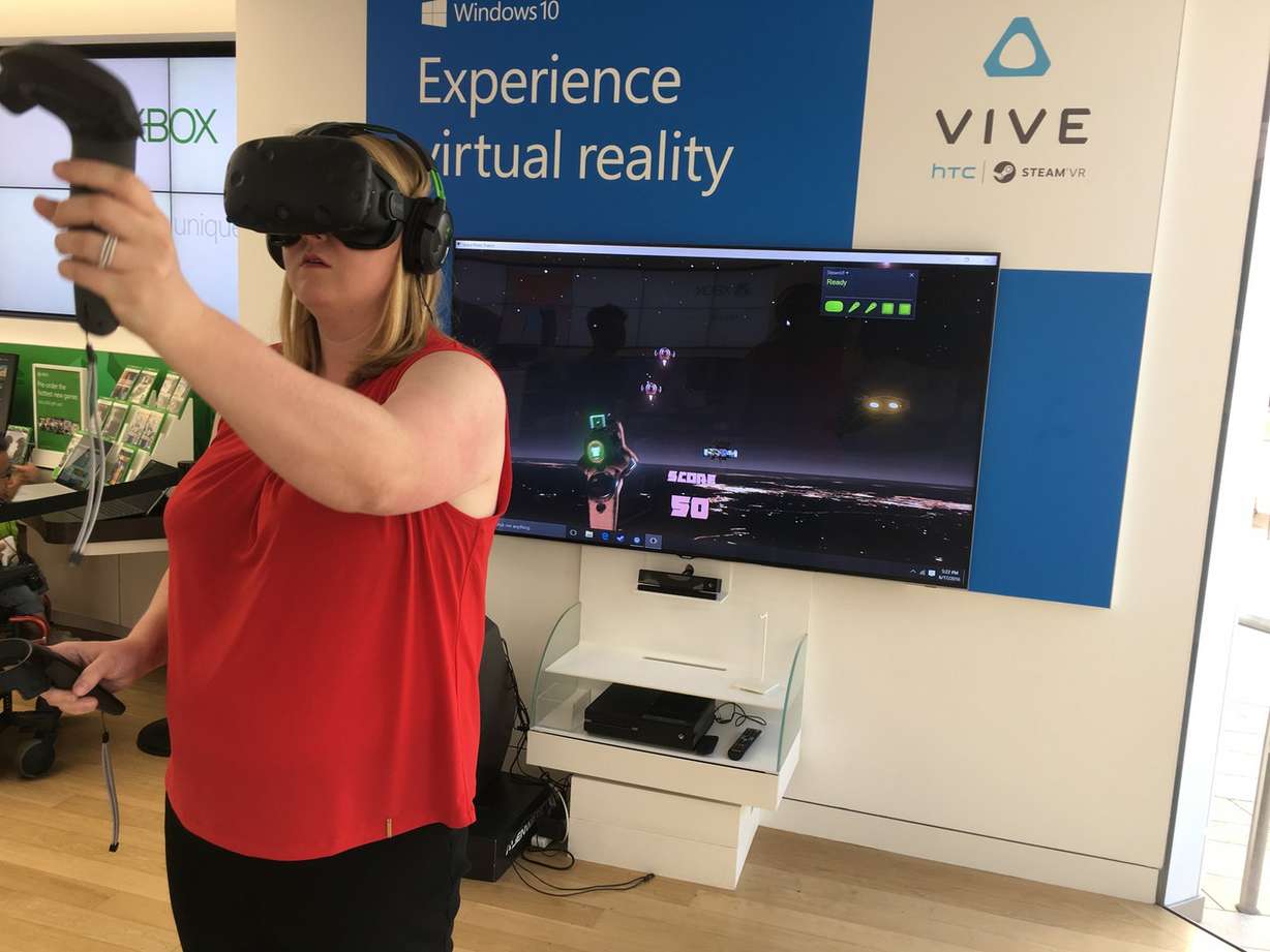The author, Carrie Rogers-Whitehead, plays Space Pirate Trainer on the Vive. (Photo: Carrie Rogers-Whitehead)
