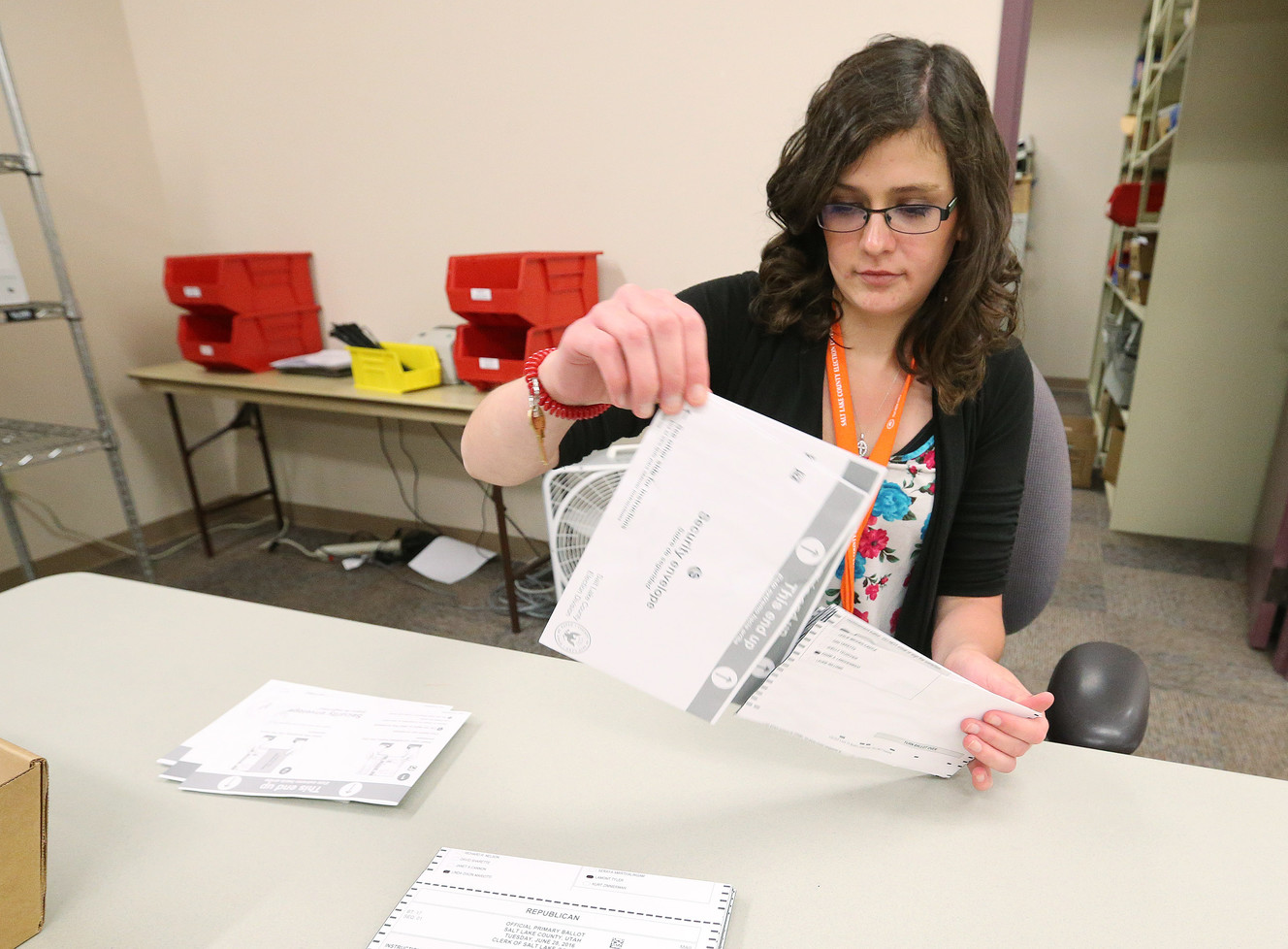 Monica Martinez prepares ballots for tabulation. Photo: Jeffrey D. Allred, Deseret News