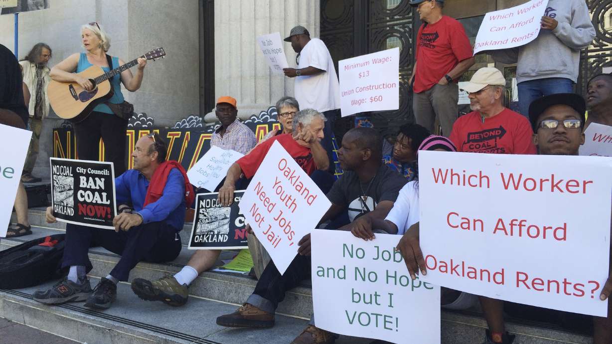 The Latest: Oakland council bans coal shipments