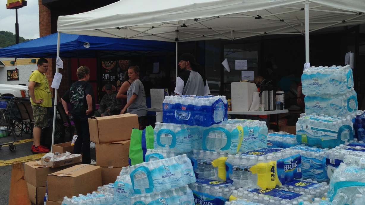 In rain-soaked West Virginia, flood victim planning funerals