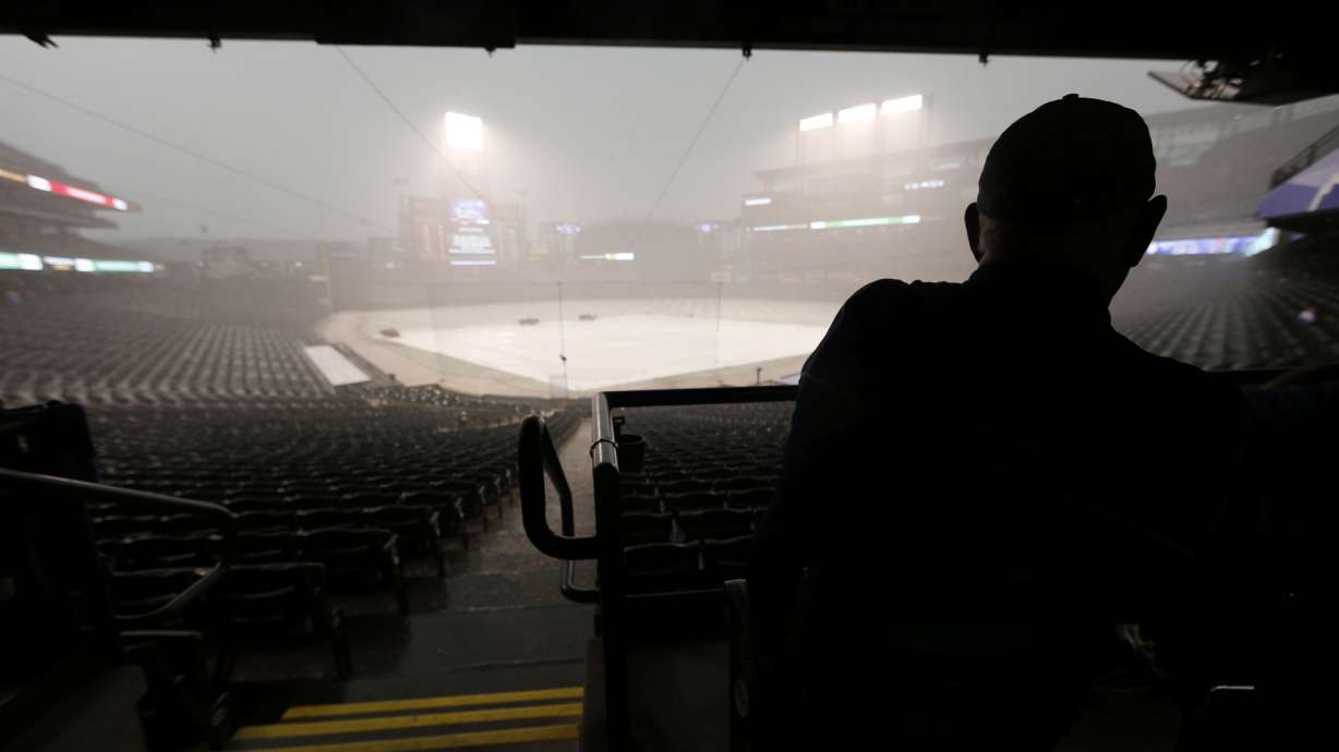 Hail, flooding cause delay at Coors before Jays-Rockies
