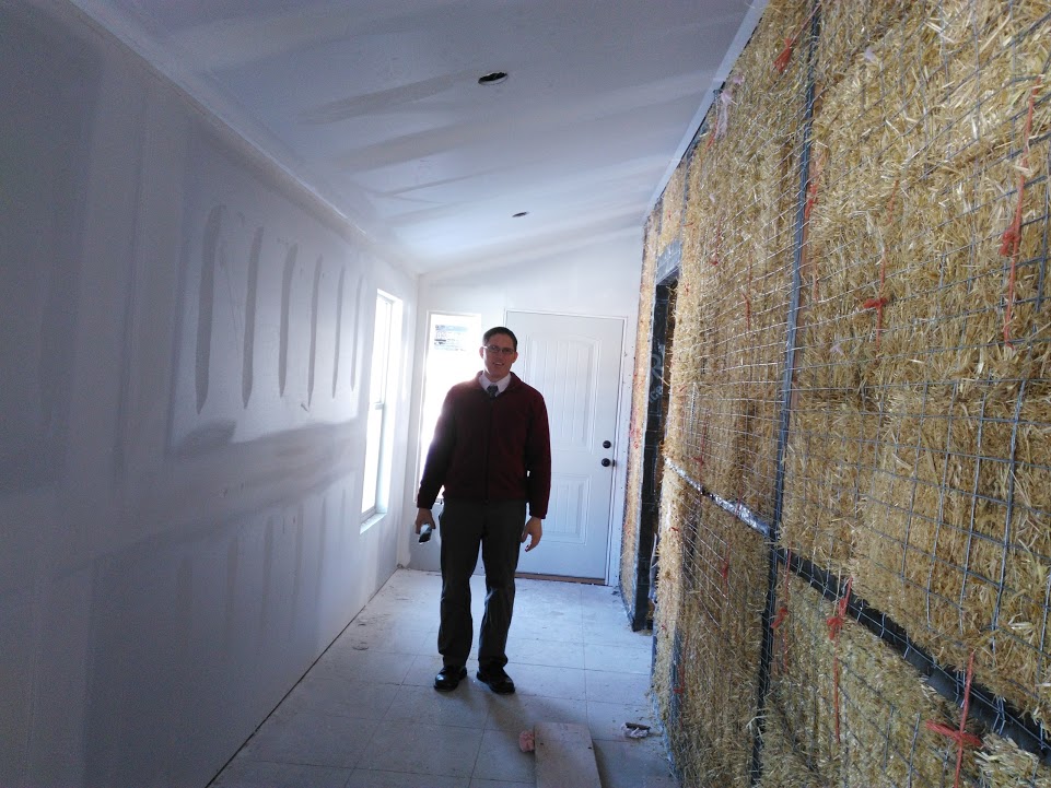Frustrated with heating bills, Utahn builds straw bale house