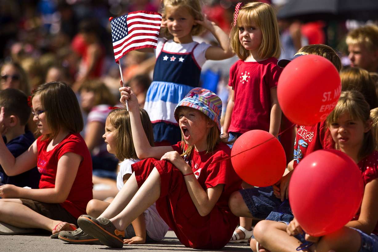 Thousands of children and parents lined University Avenue for Provo's annual Freedom Festival parade on Saturday morning. Provo, Utah, Saturday, July 4, 2009. (Photo: Brendan Sullivan, Deseret News archives)