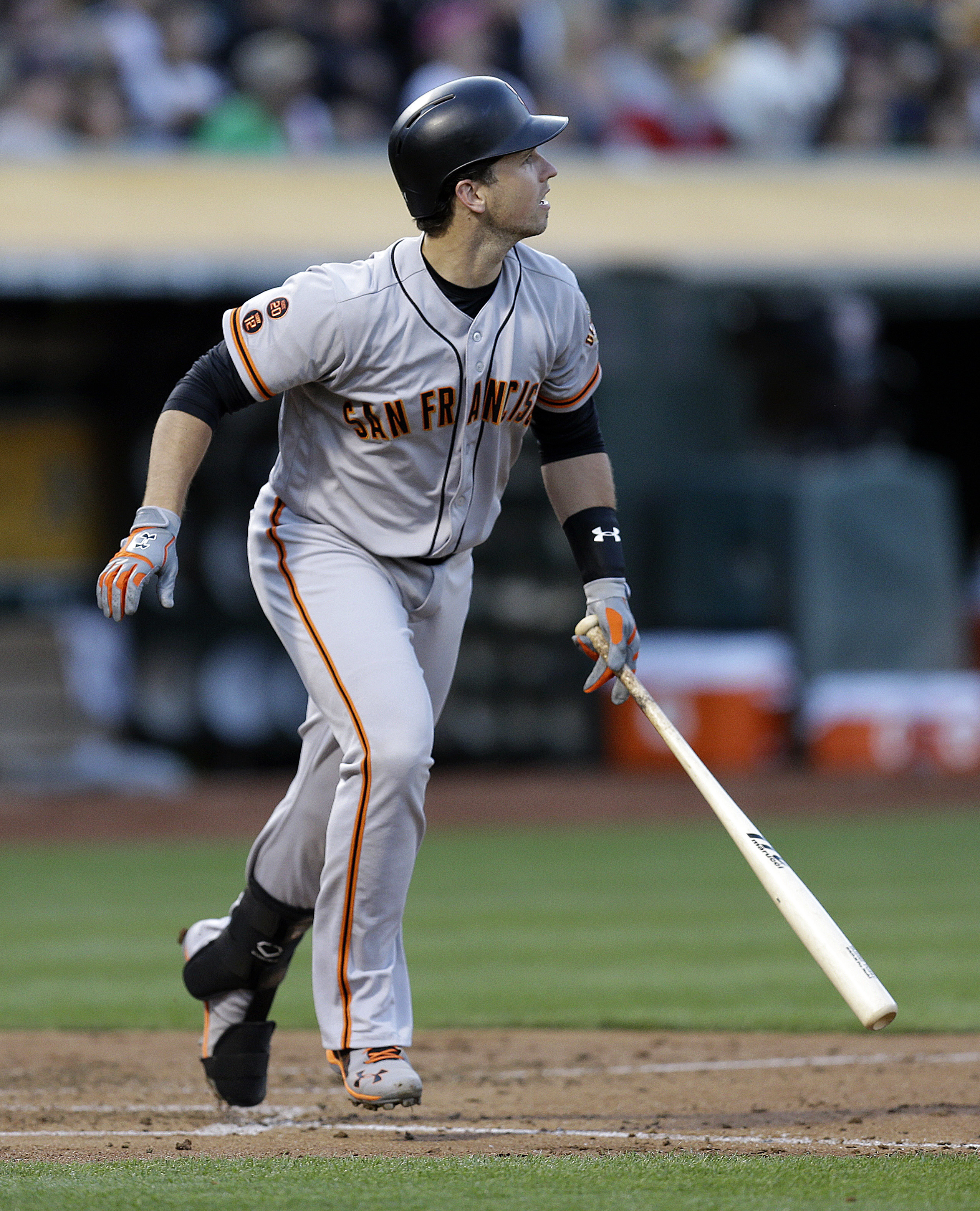 Bumgarner pitches Giants to win and swings the bat, too