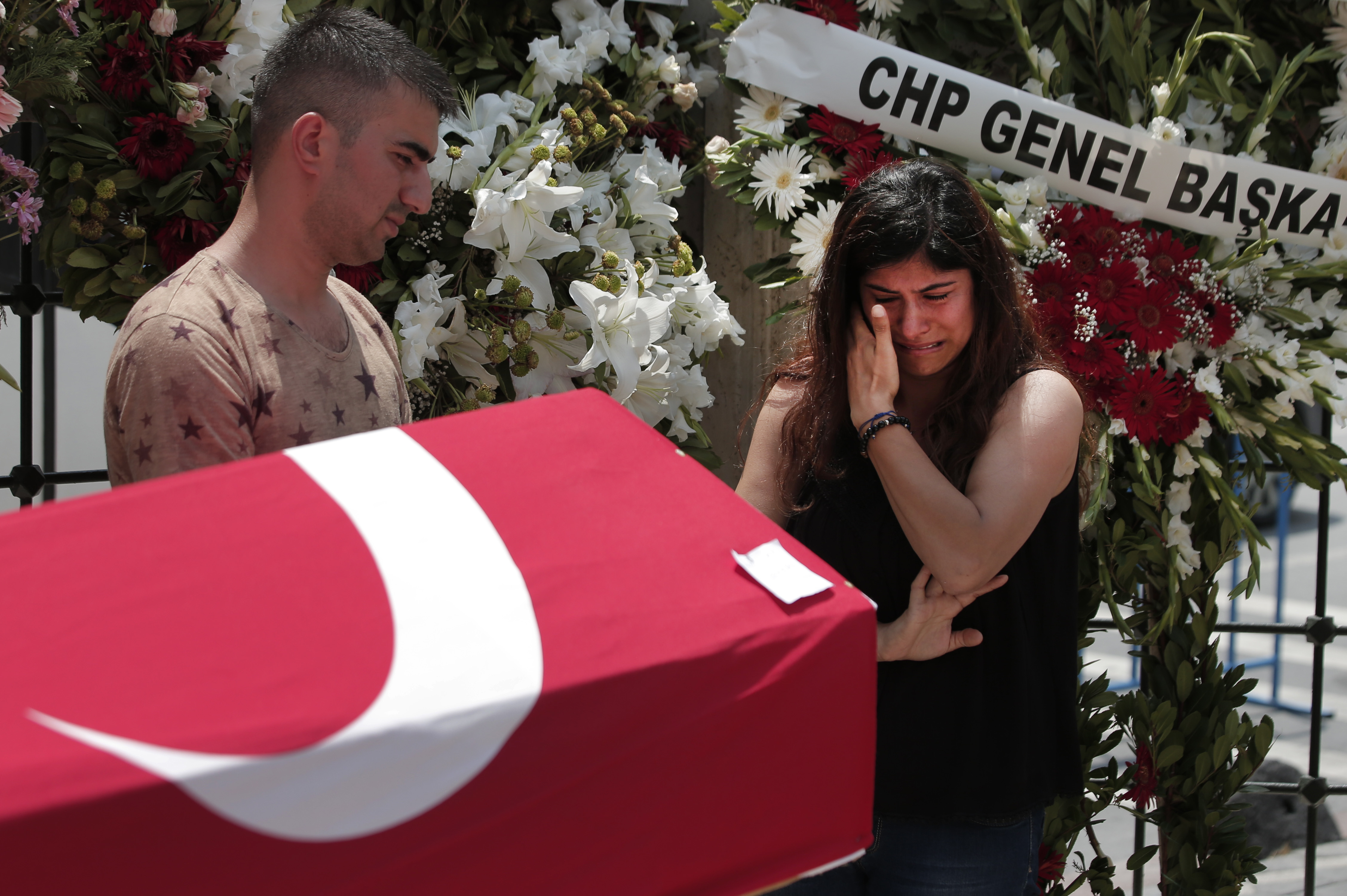 The Latest: Tunisian town buries doctor killed in Istanbul