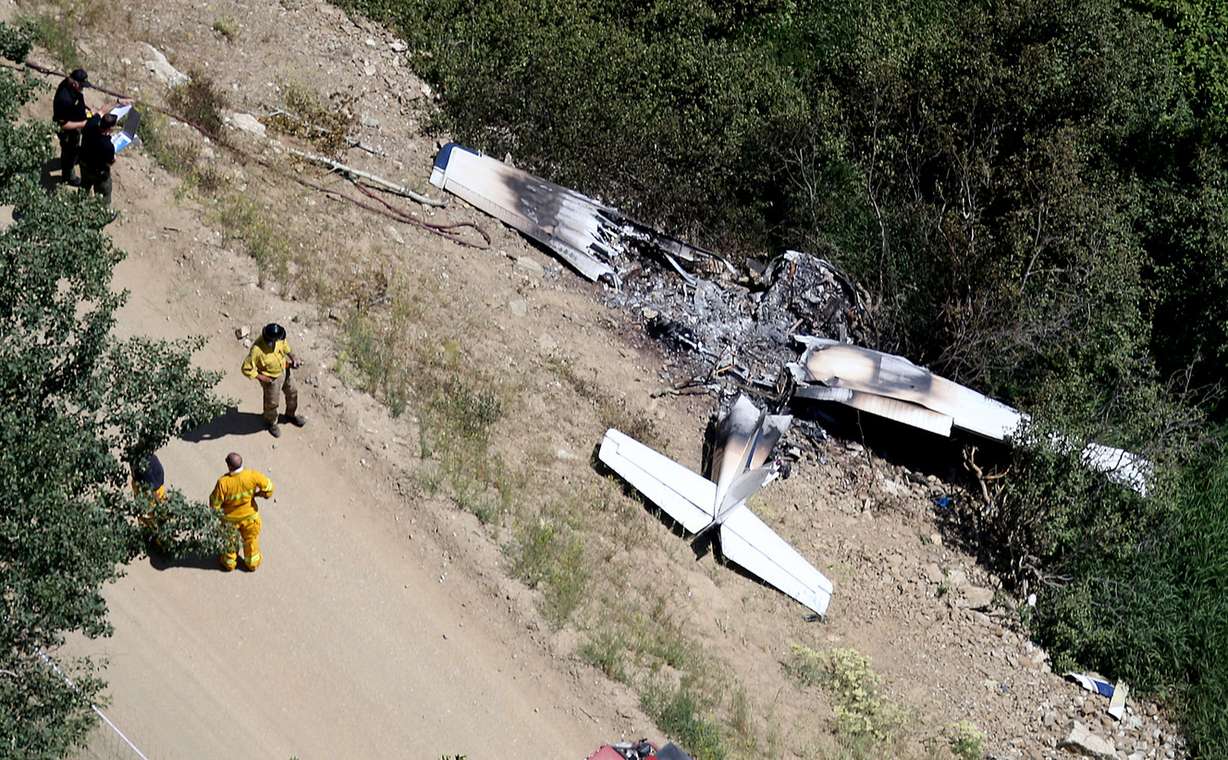 Davis County Sheriff's Office, Farmington Fire Department and Forest Service officials respond to a plane crash in Farmington Canyon on Friday, July 1, 2016. (Photo: Laura Seitz, Deseret News)