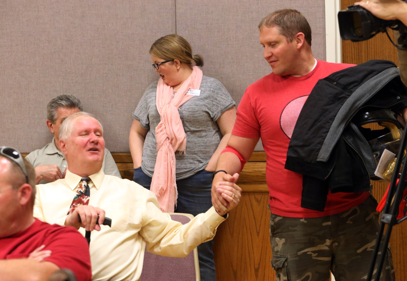 West Jordan police officer Cory Jensen, who is recovering from Guillain-Barre syndrome, right, talks with friend Dustin Cahoon at a blood drive in Jensen's honor in West Jordan on Friday, July 1, 2016. (Photo: Scott G Winterton, Deseret News)