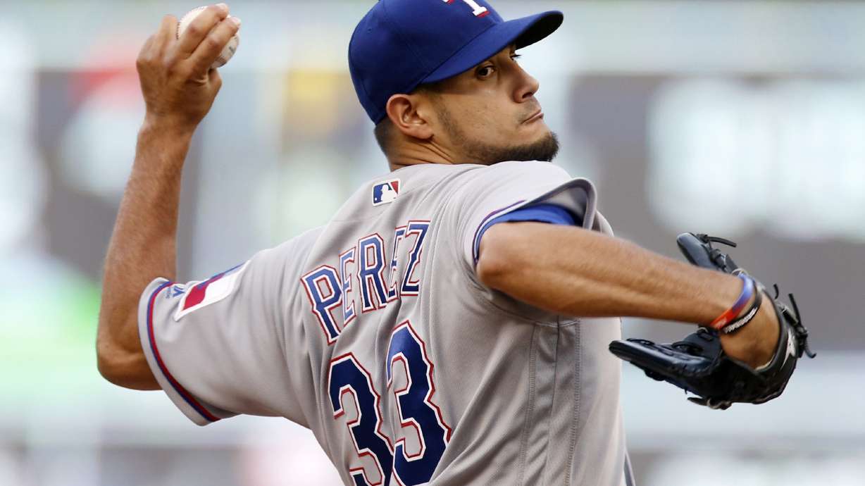 Desmond, Dyson lead Rangers past Twins 3-2 in 10 innings
