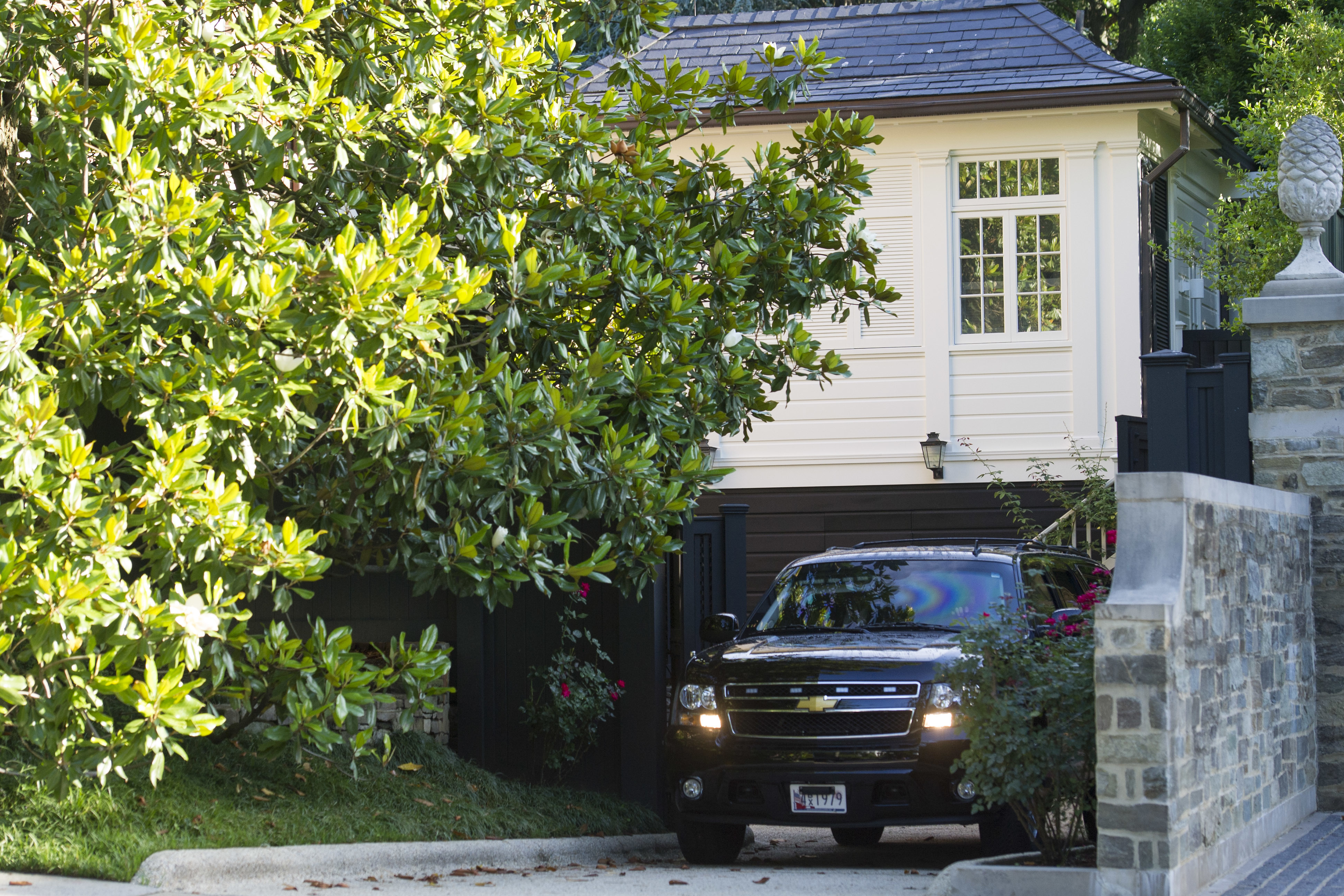 A Secret Service vehicle departs the home of Democratic presidential candidate Hillary Clinton in Washington, Saturday, July 2, 2016. (AP Photo/Cliff Owen)
