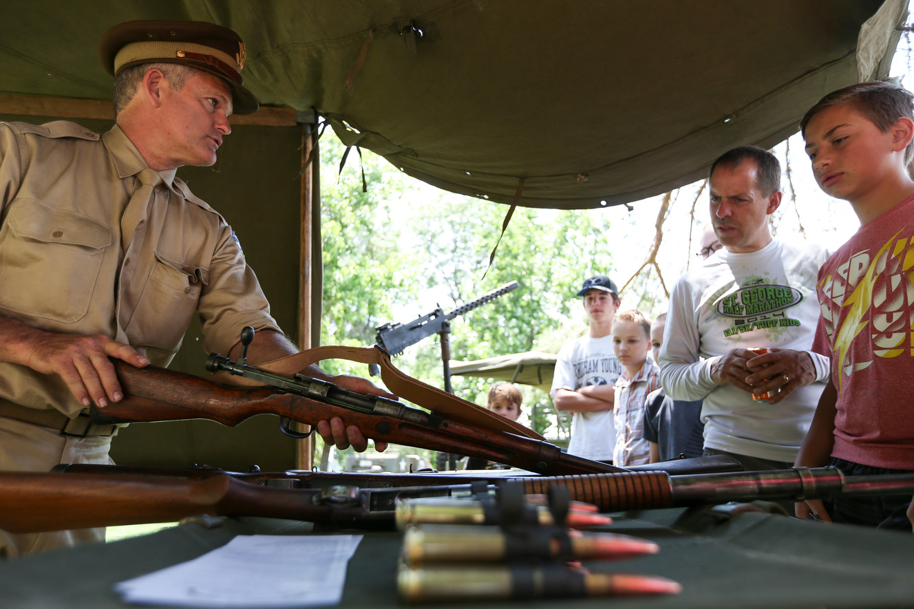 David Turley, left, shows off antique firearms at the Cries of Freedom at SCERA Park in Orem on Saturday, July 2, 2016. (Photo: Spenser Heaps, Deseret News)