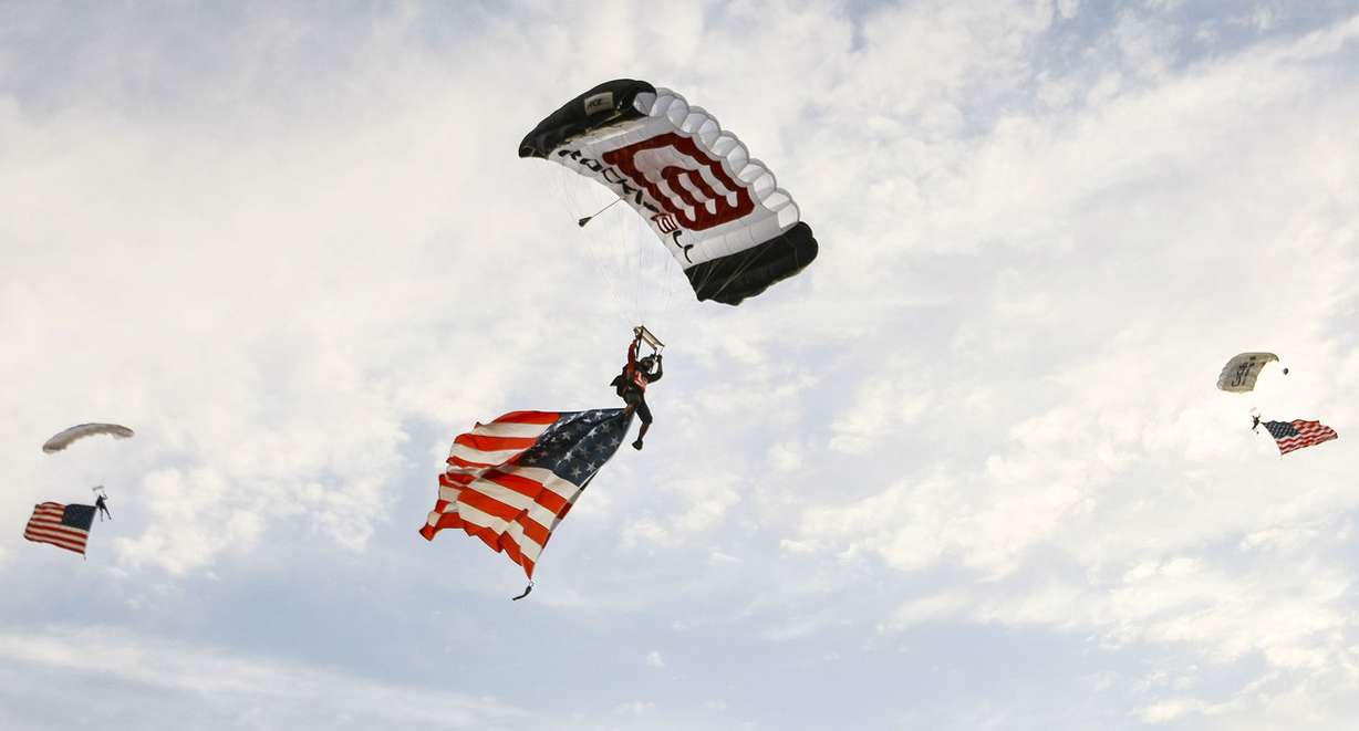 Skydivers drop onto the field at 36th annual Stadium of Fire at Lavell Edwards Stadium in Provo on Saturday, July 2, 2016. (Photo: Weston Kenney, Deseret News)