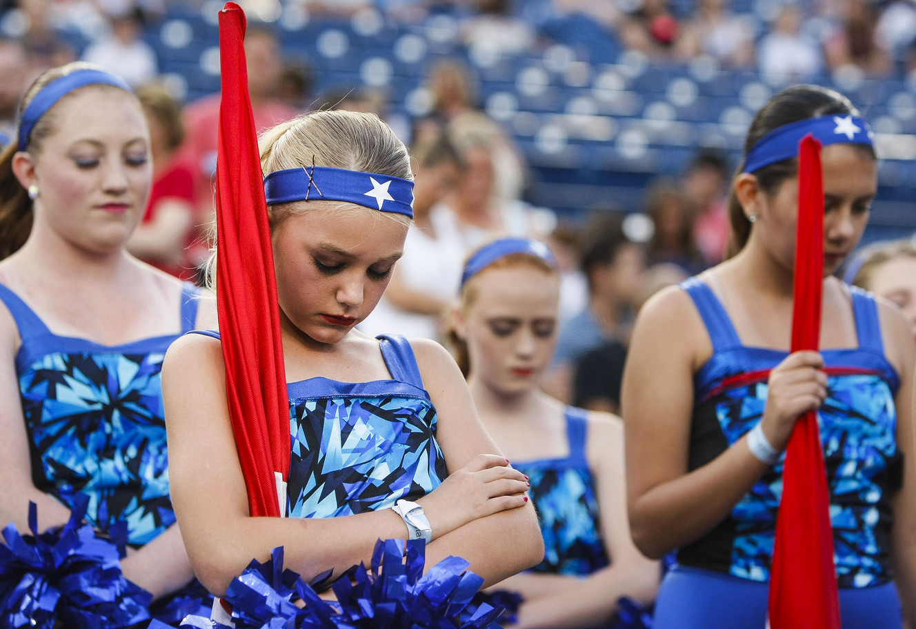 Performers take a moment of prayer before the start of the 36th annual Stadium of Fire at Lavell Edwards Stadium in Provo on Saturday, July 2, 2016. (Photo: Weston Kenney, Deseret News