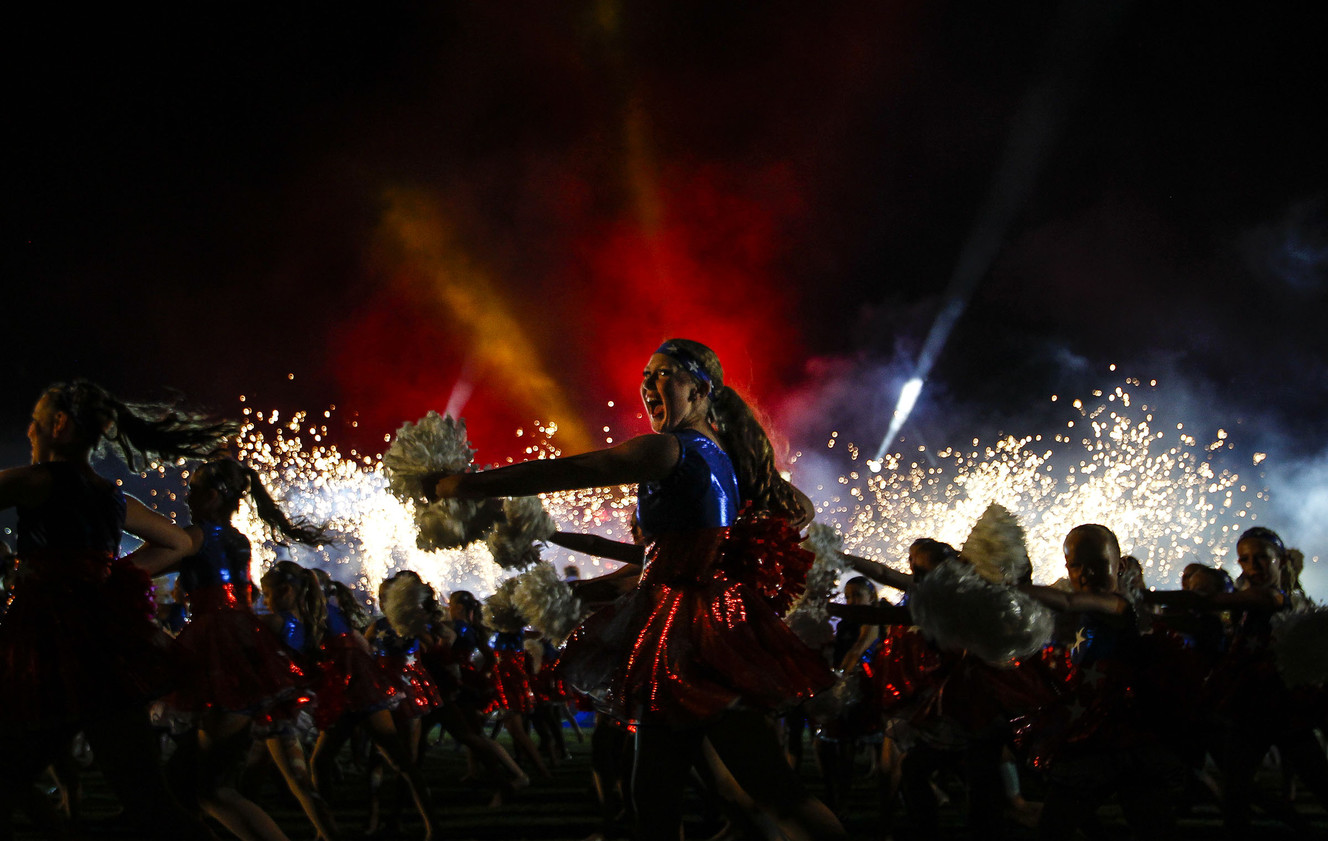 Performers dance while fireworks are shot into the air at 36th annual Stadium of Fire at Lavell Edwards Stadium in Provo on Saturday, July 2, 2016. (Photo: Weston Kenney, Deseret News)