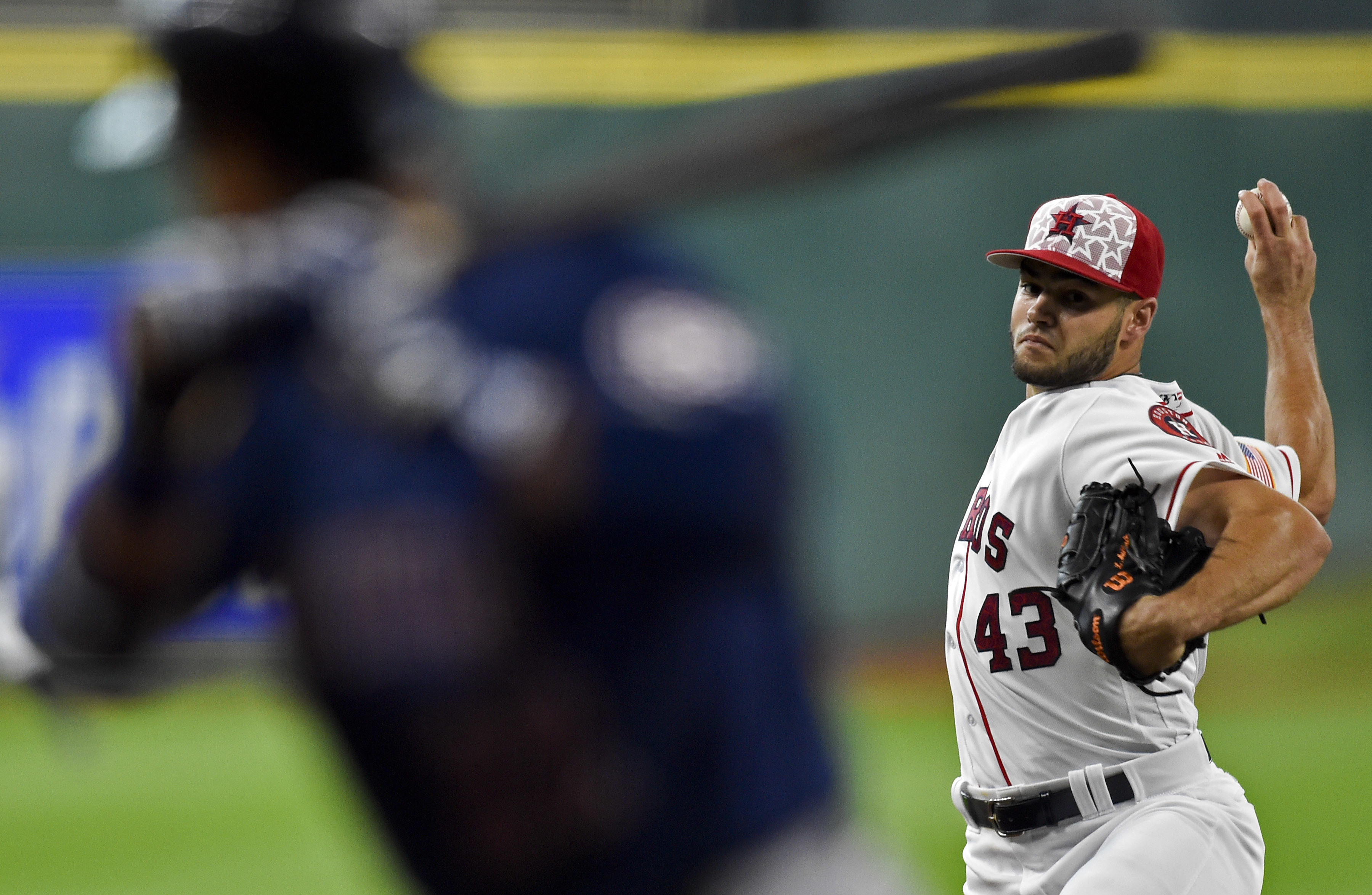 McCullers, Springer lead Astros to 2-1 win over Mariners