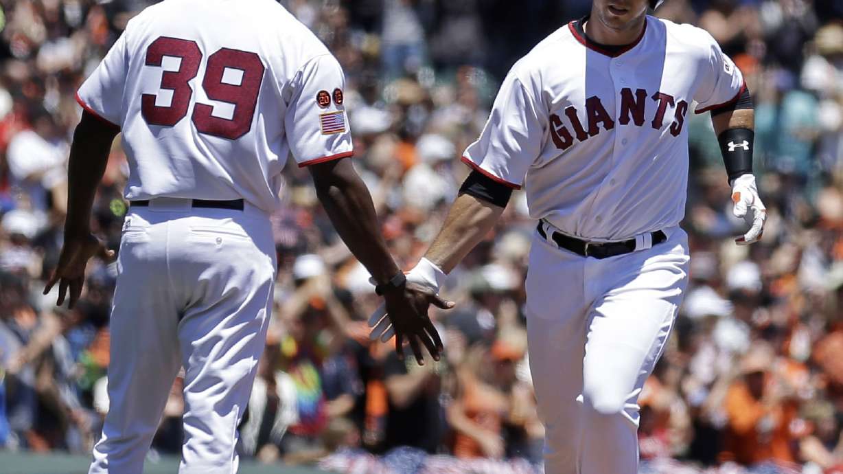 Pagan, Posey hit homers as Giants beat Rockies behind Peavy