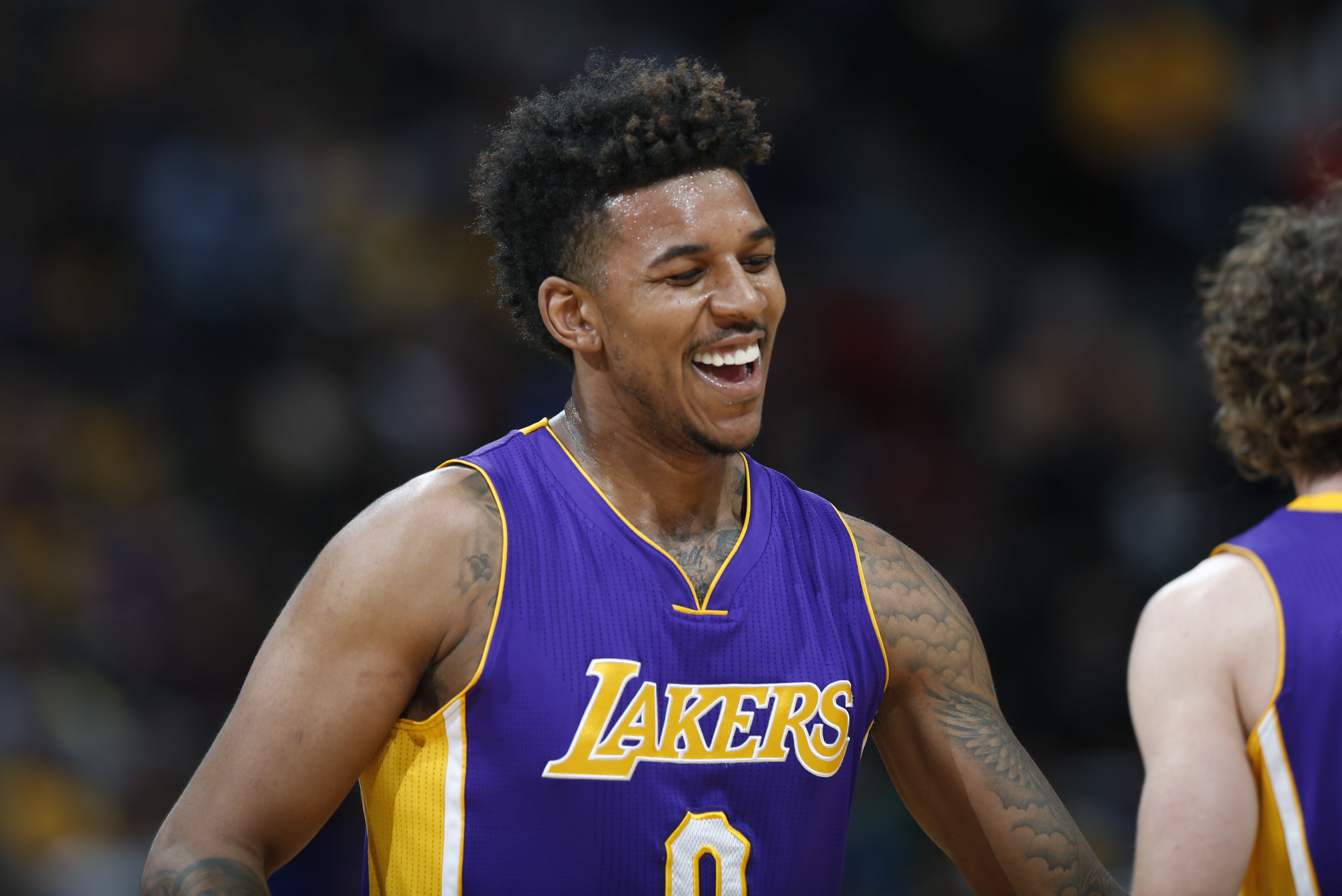 Video shows Lakers' Nick Young holding firework that bursts