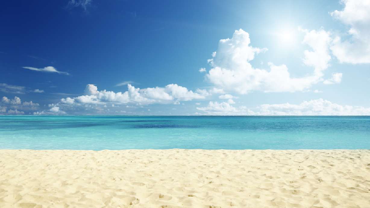 Not your average family vacation: 3 Arizona men help save boy buried in sand