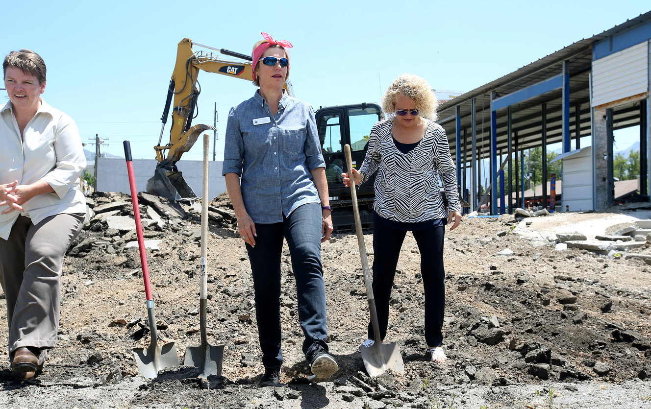 Sugar House Community Council Chairwoman Amy Barry, left, Salt Lake City Councilwoman Lisa Adams and Salt Lake City Mayor Jackie Biskupski take part in a ceremonial “demolition.” (Photo: Laura Seitz, Deseret News)