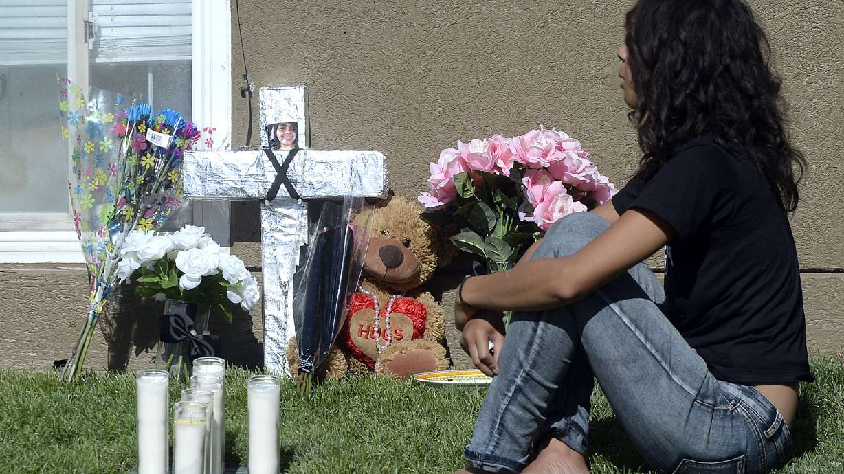 The Latest: Man arrested in shooting over T-shirt