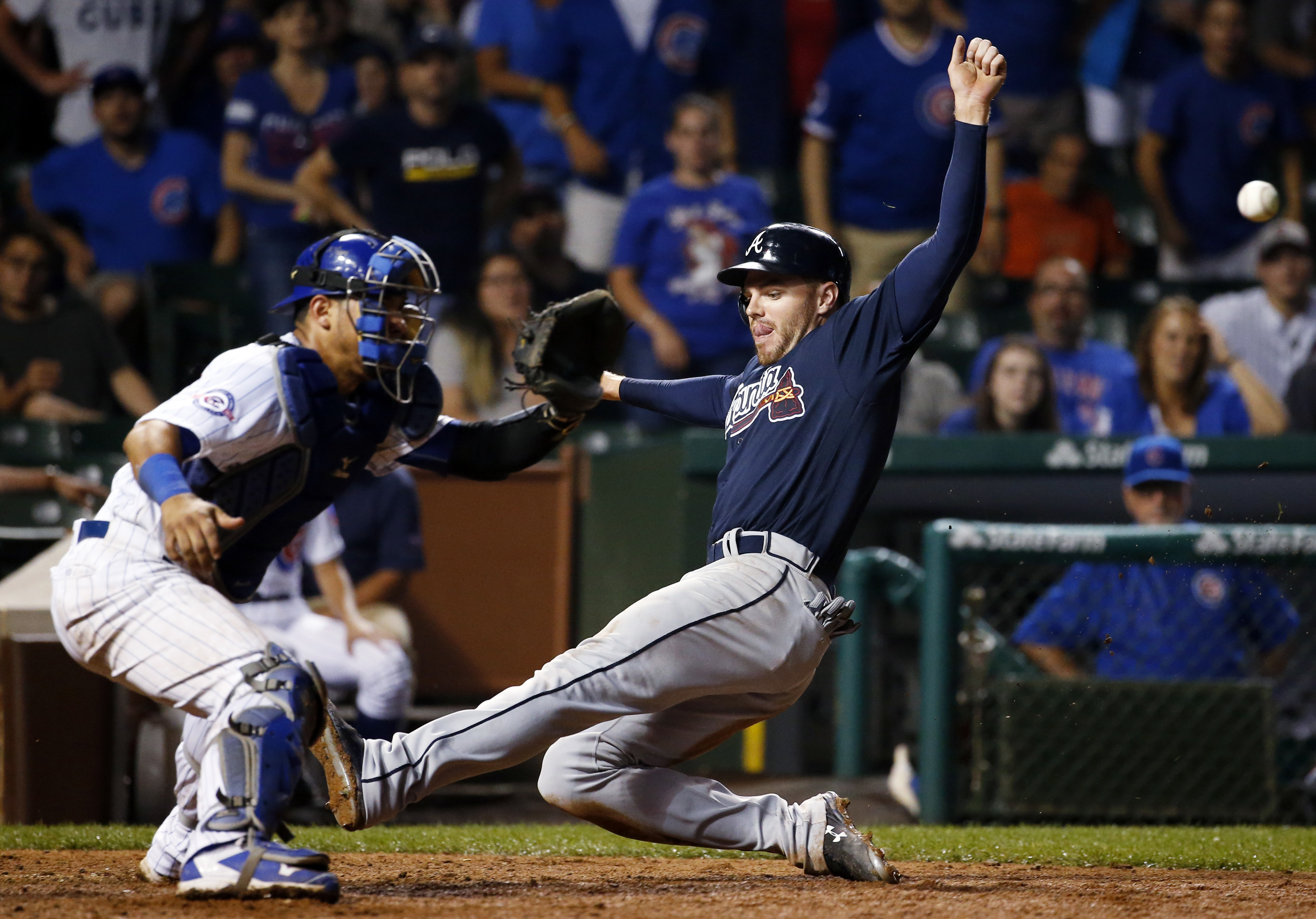 Markakis homers twice, Braves beat slumping Cubs in 11