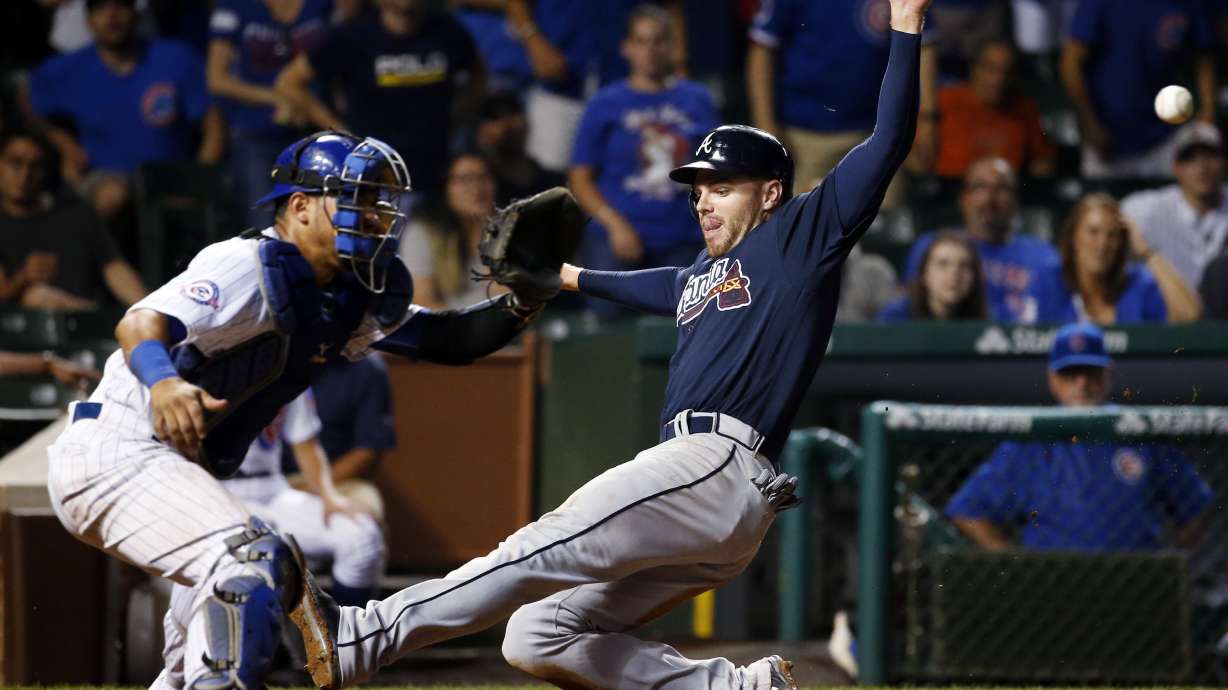 Markakis homers twice, Braves beat slumping Cubs in 11