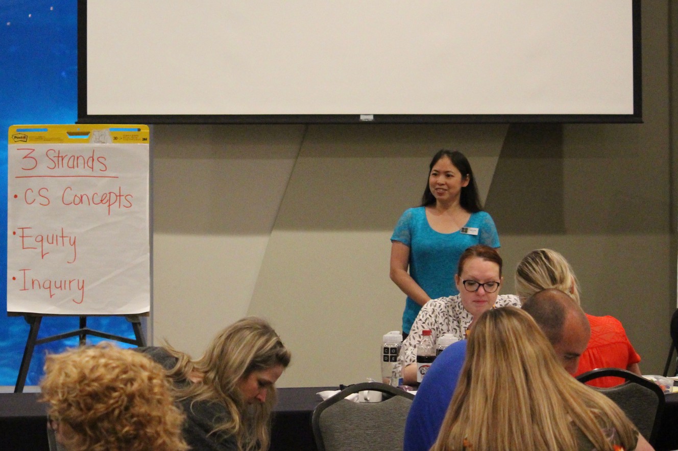 Helen Hu speaks at a computer science workshop. (Photo: Courtesy of Helen Hu)