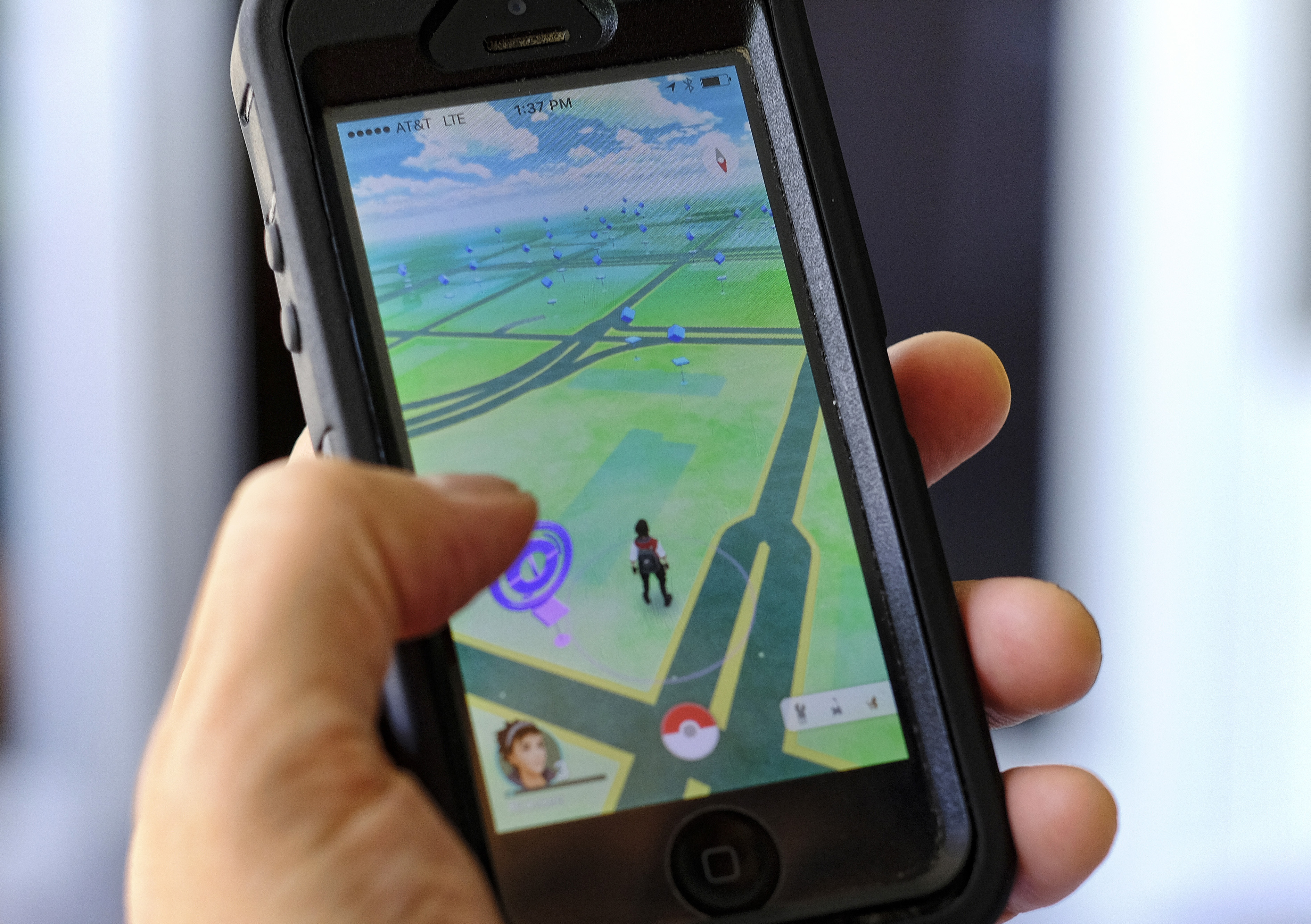 Players in hunt for Pokemon Go monsters feel real-world pain