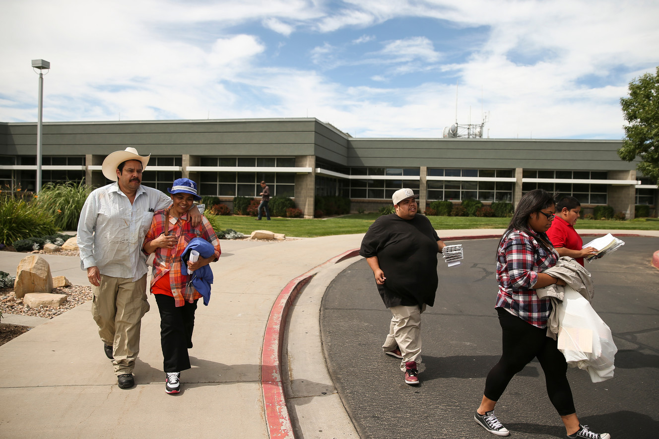 Martin Chairez-Castrejon walks with his arm around his wife, Lorena Gonzalez, after being released from the Utah County Jail. Photo: Spenser Heaps, Deseret News