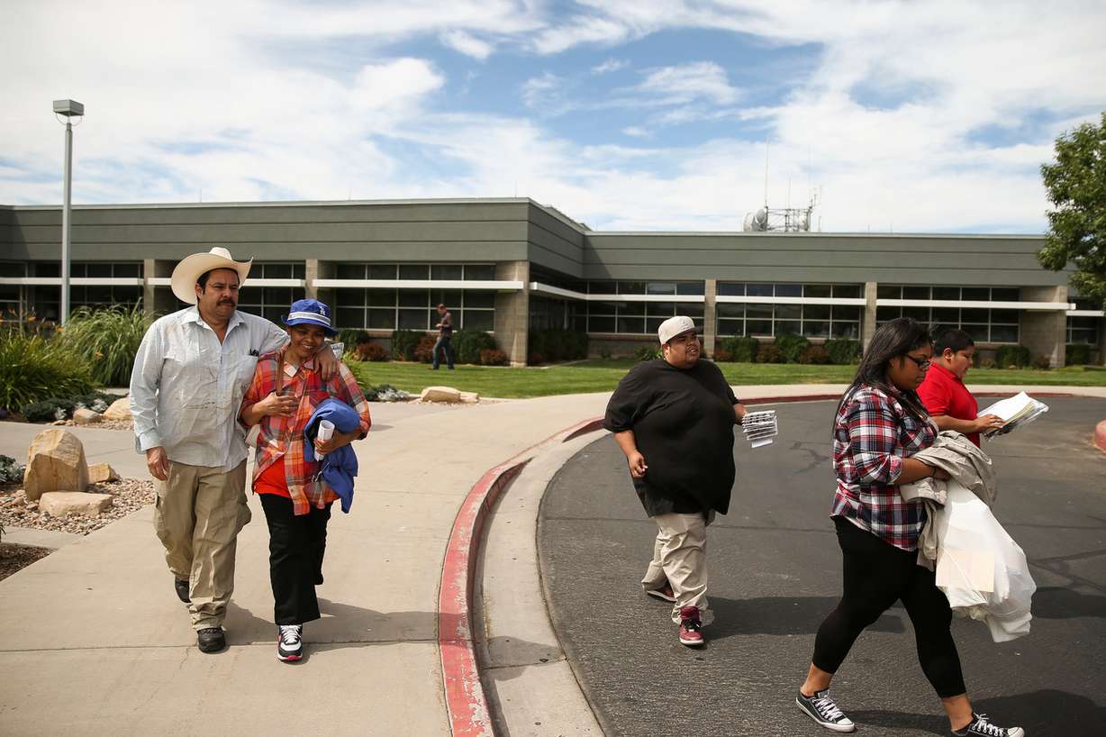 Martin Chairez-Castrejon walks with his arm around his wife, Lorena Gonzalez, after being released from the Utah County Jail. Photo: Spenser Heaps, Deseret News