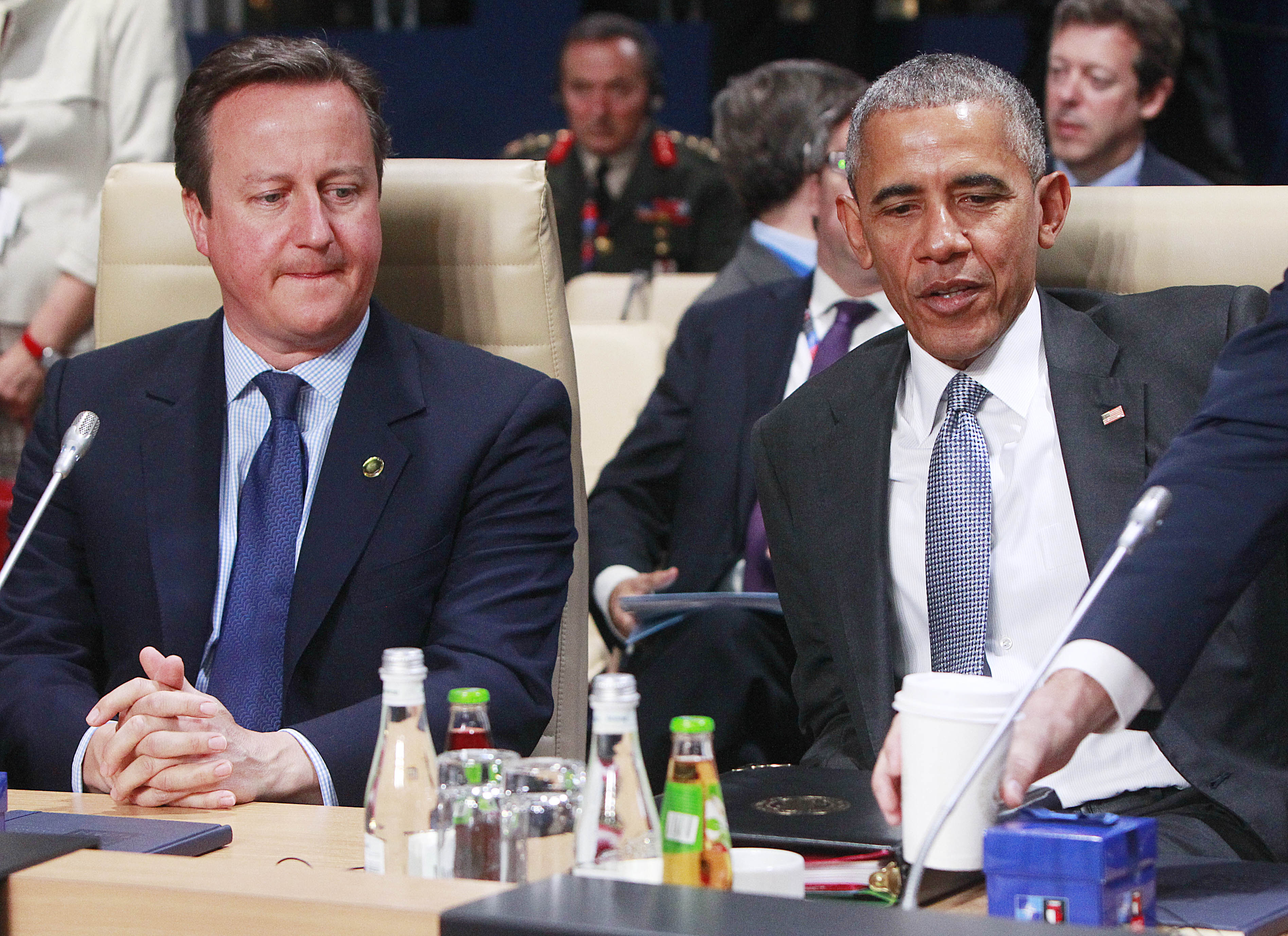 Obama asks Americans not to fear a return to a dark past
