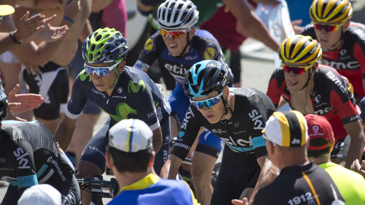 Through hail and heat, Froome stays in control of Tour
