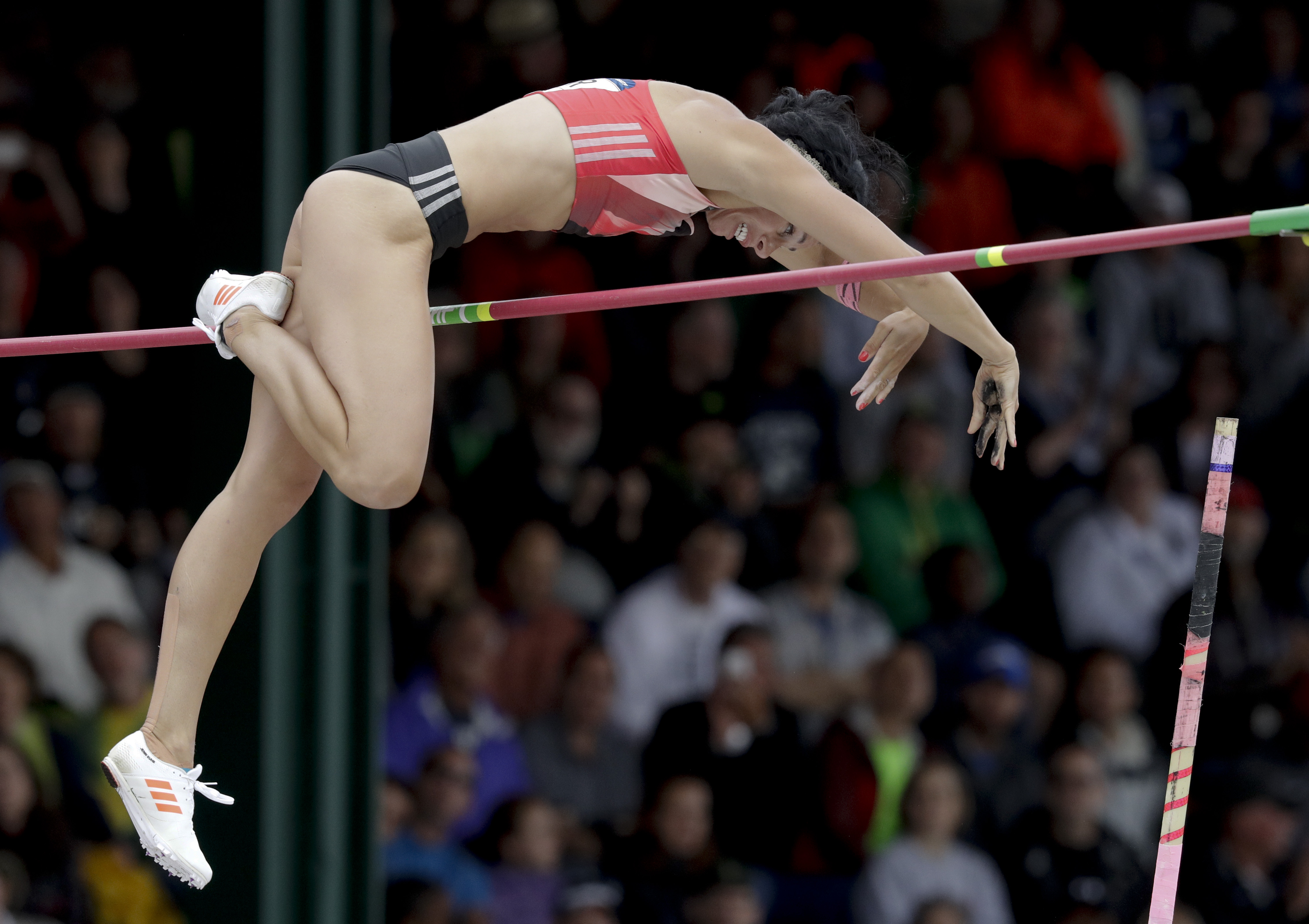 The Latest: Douglas fighting for spot on gymnastics team
