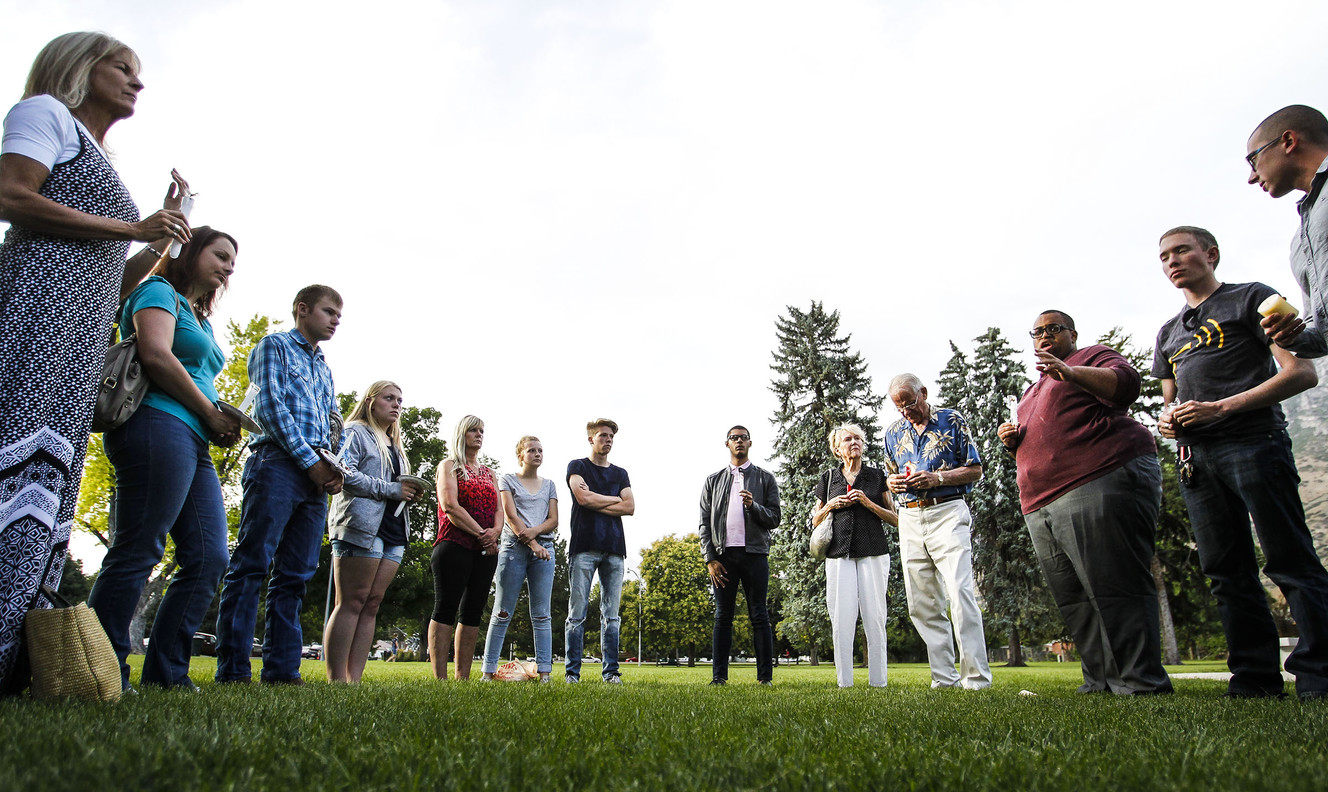 Utahns gather for a vigil in remembrance for the police officers who died in a shooting in Dallas at Memorial Park in Provo on Sunday, July 10, 2016. (Photo: Weston Kenney, Deseret News)