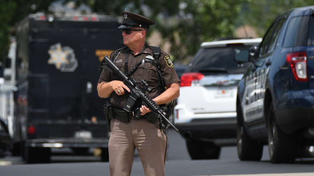 The Latest: Inmate who killed 2 was facing major charges